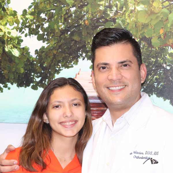 Dr. Palacios smiling with ortho patient